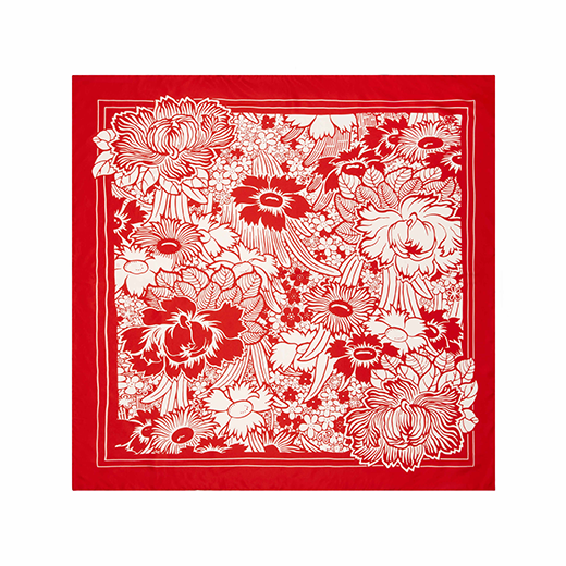 A square silk scarf with a red floral pattern.